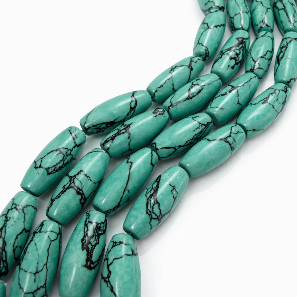 Blue Magnesite Barrel Bead 20mm Strand