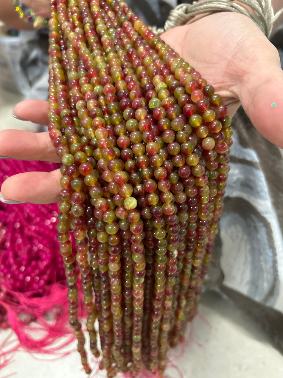 Magenta and Green Round Bead Jade Strand