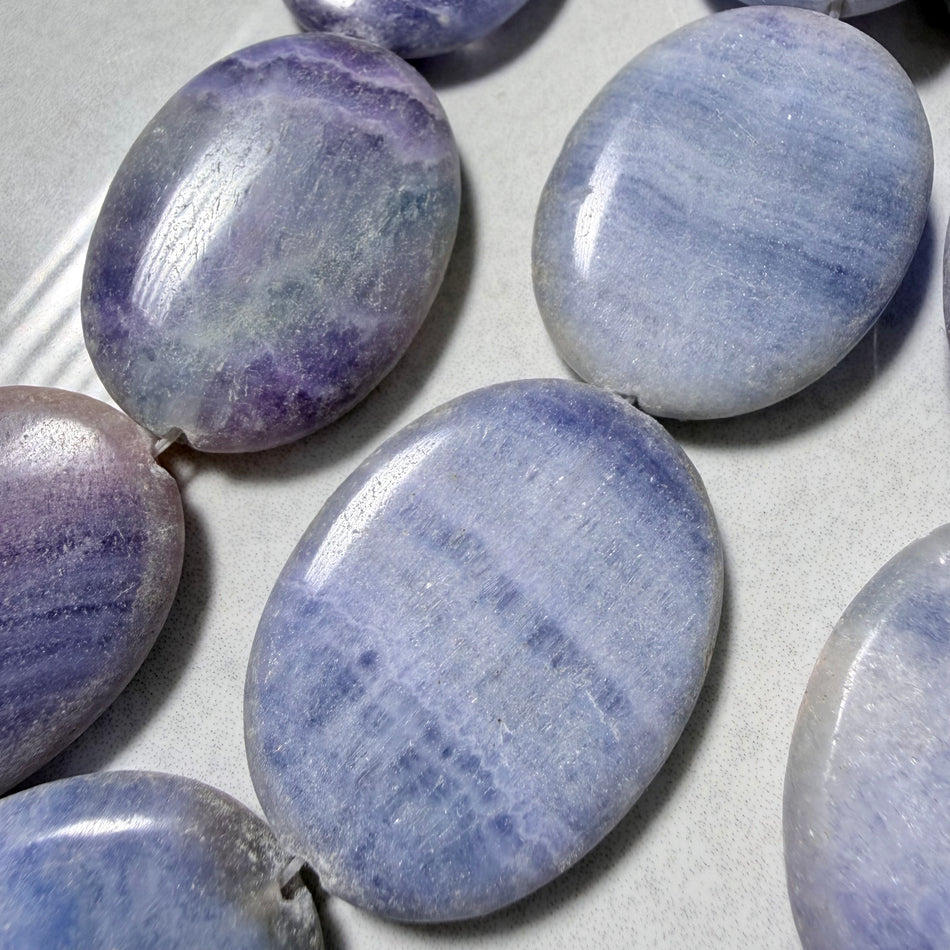 Oval Blue-Purple Howlite Flat Bead 40mm Strand