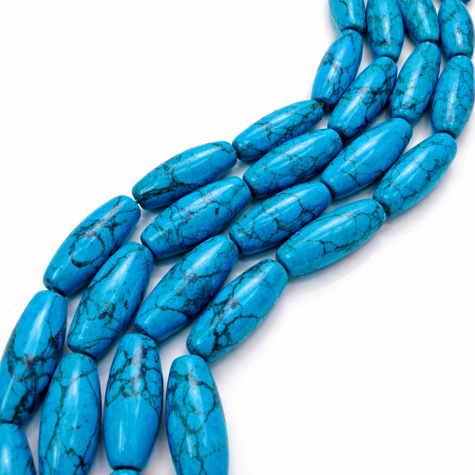Blue Magnesite Barrel Bead 20mm Strand
